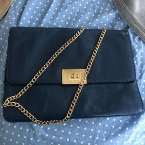 Michael Kors oversized clutch with shoulder strap